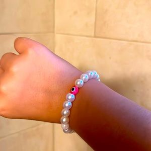 Bracelet/jewelry! Grey/white pearls and pink evil eye charm!
